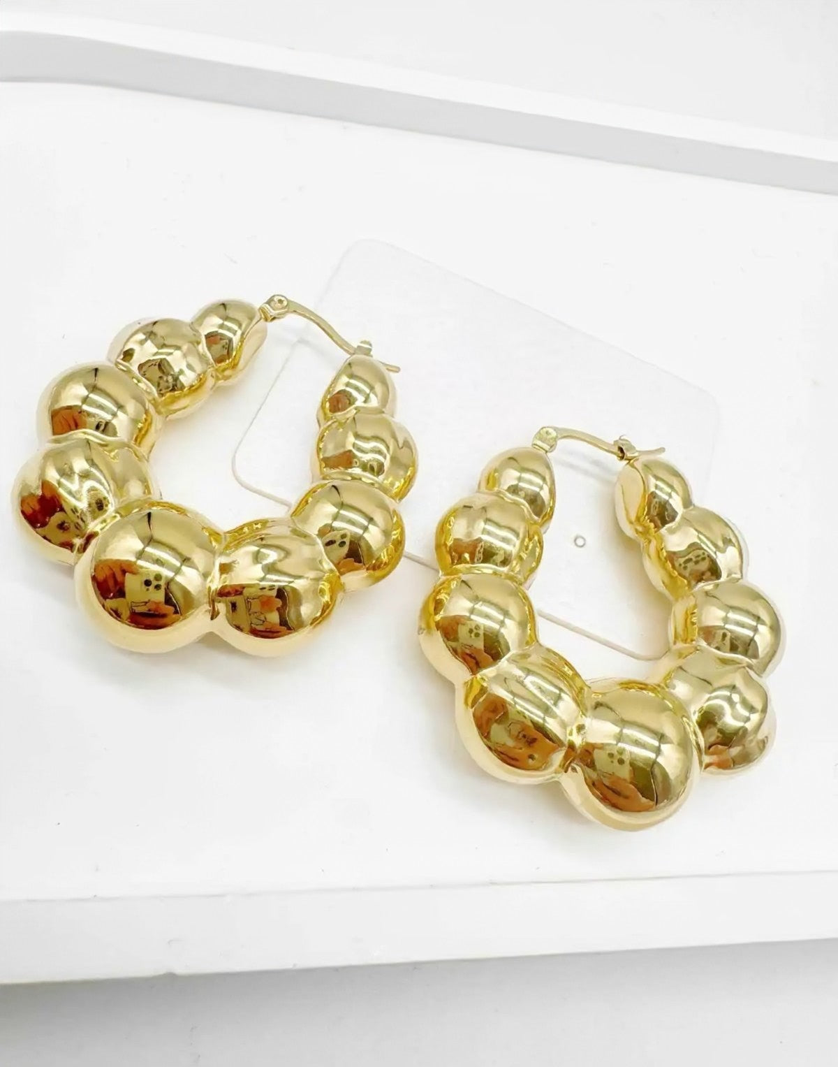 Boucles d'oreilles CAM11